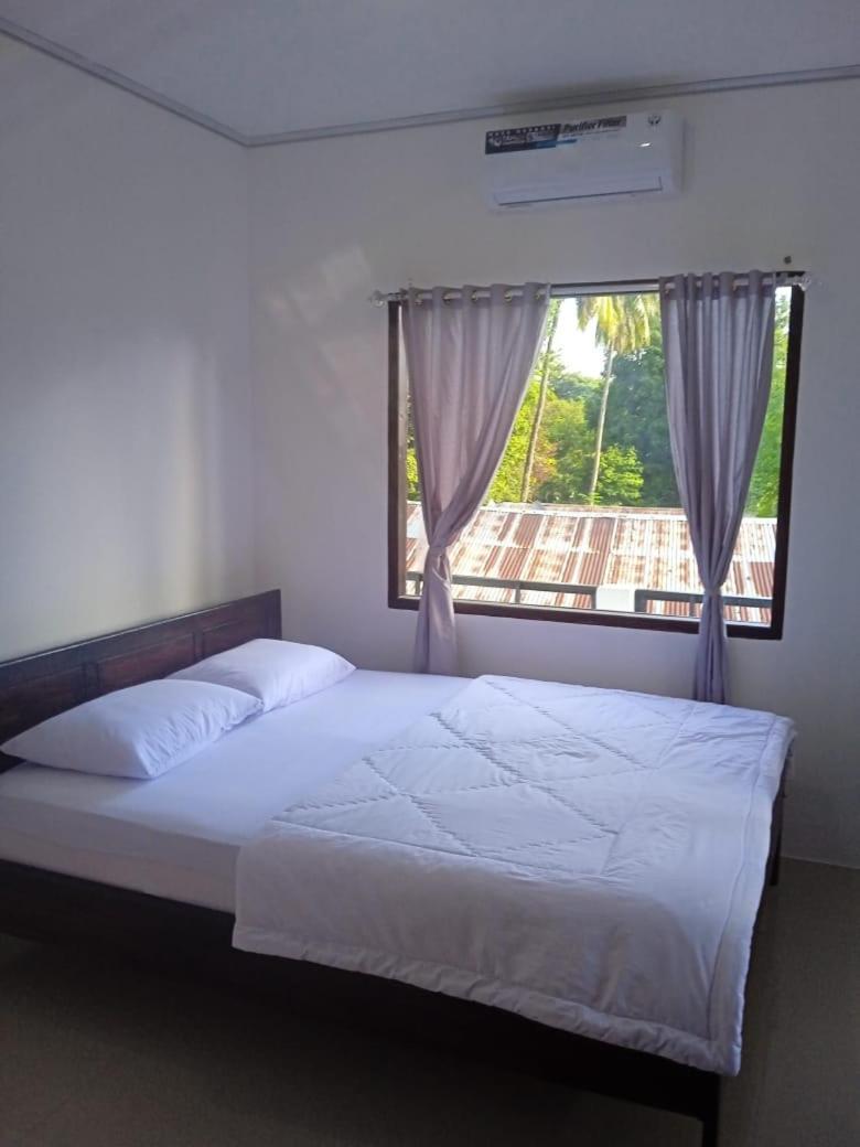 Riung Tiga Empat Tujuh Guesthouse Dış mekan fotoğraf